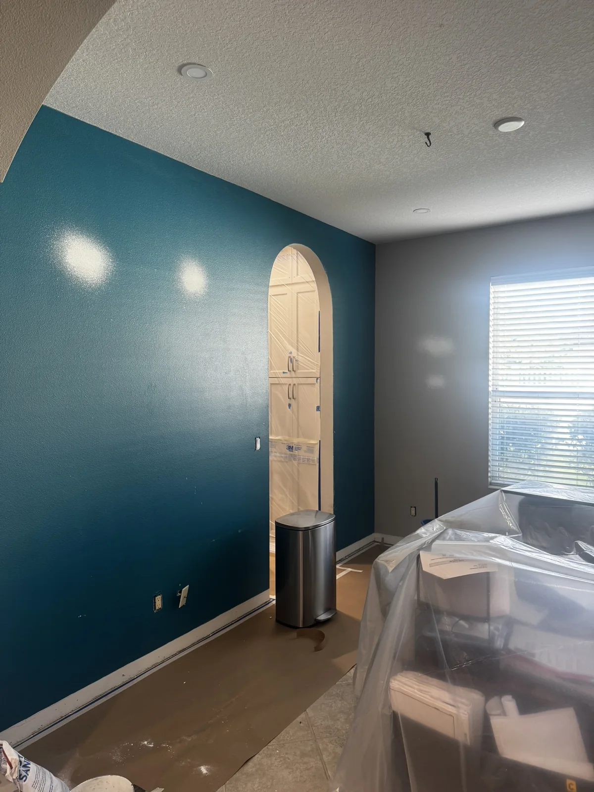 Blue accent wall interior painting
