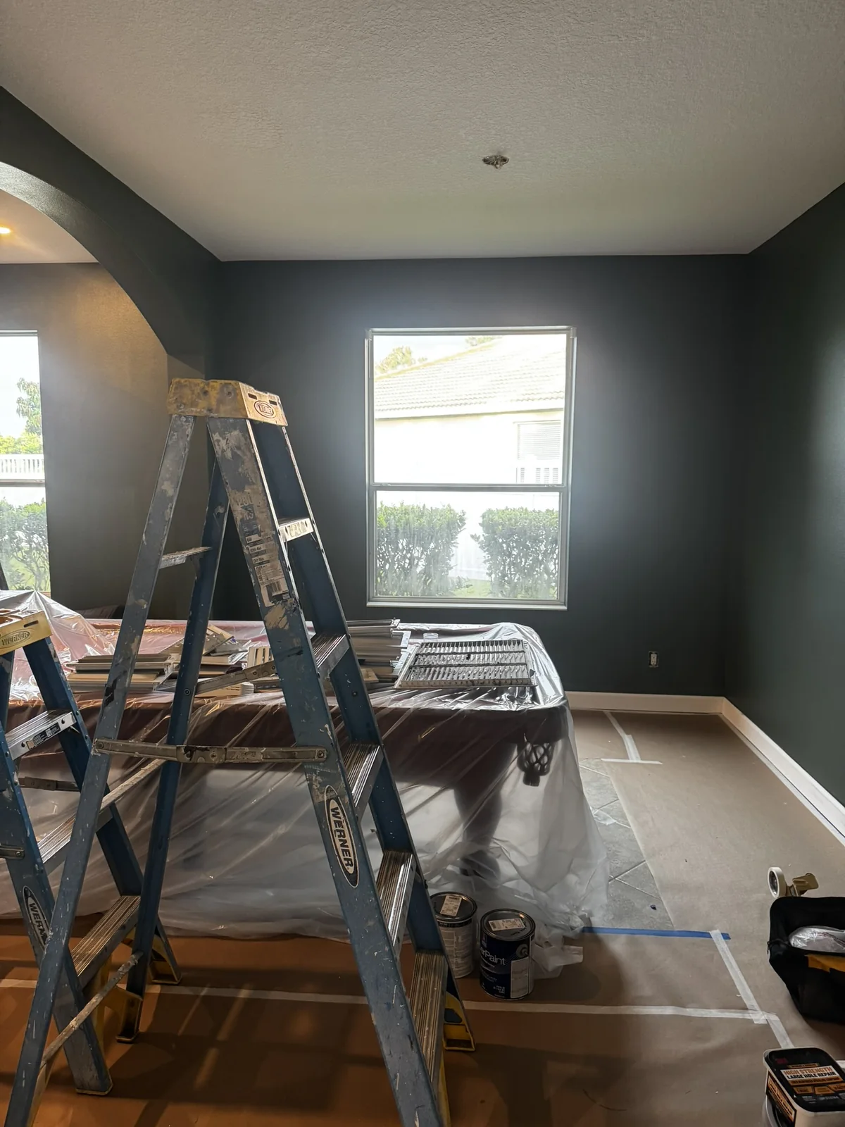 Dark accent room painting workspace