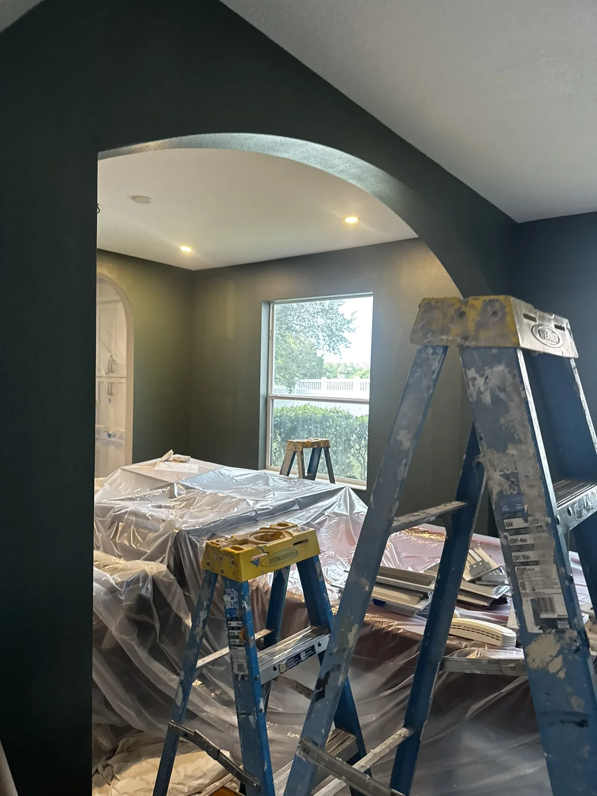 Dark accent room painting workspace