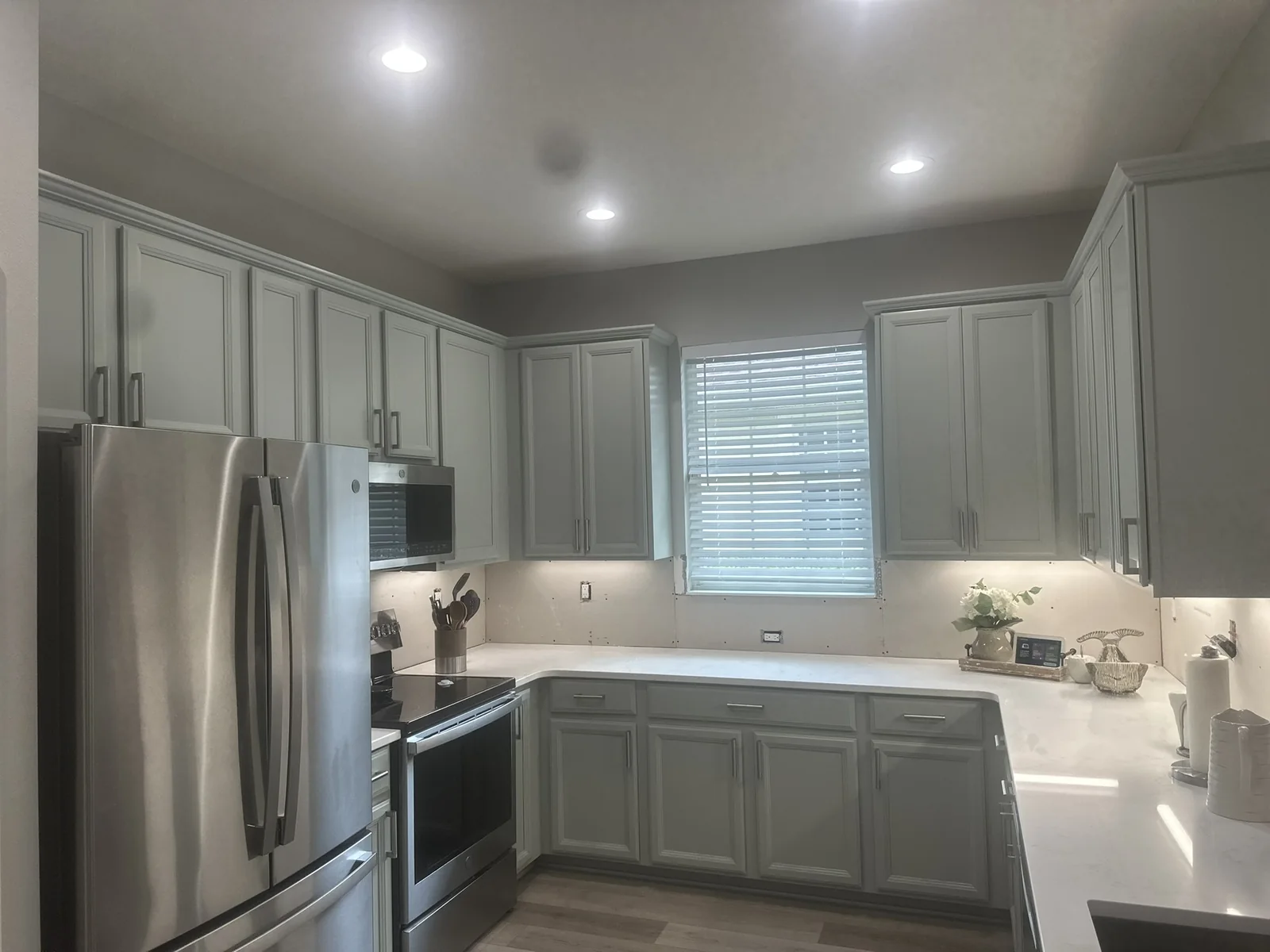Gray painted kitchen cabinets