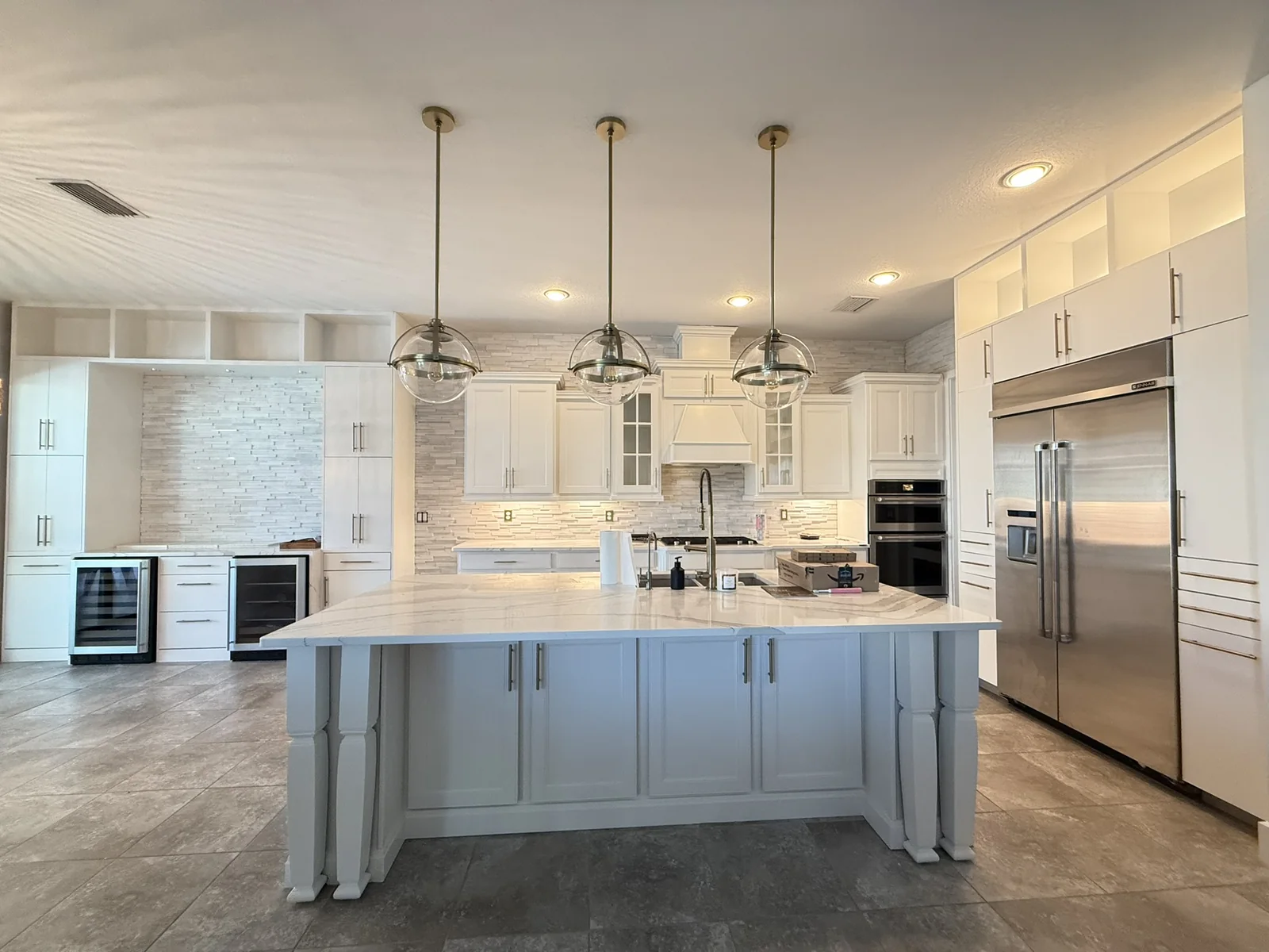 Finished white kitchen cabinets