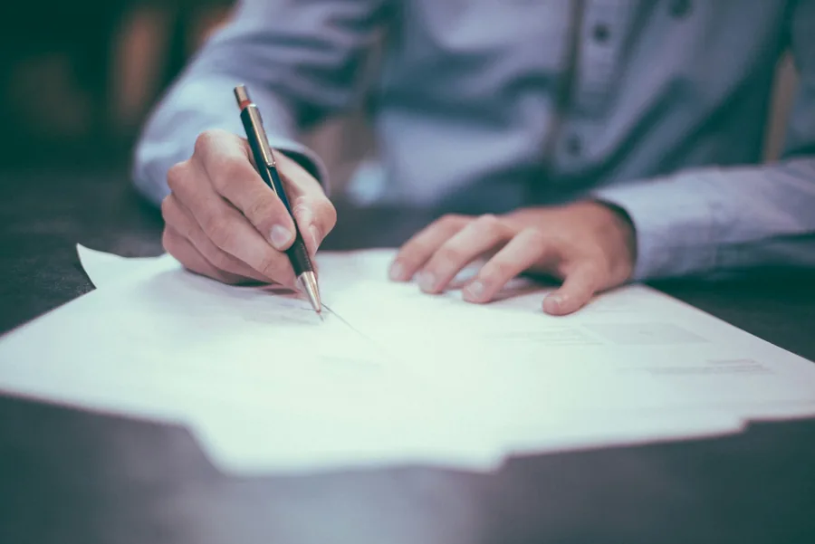 Homeowner and contractor reviewing a written project scope